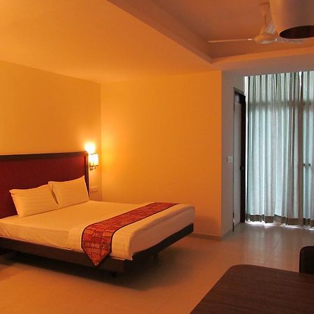 Ixora Suites Bangalore Zimmer foto