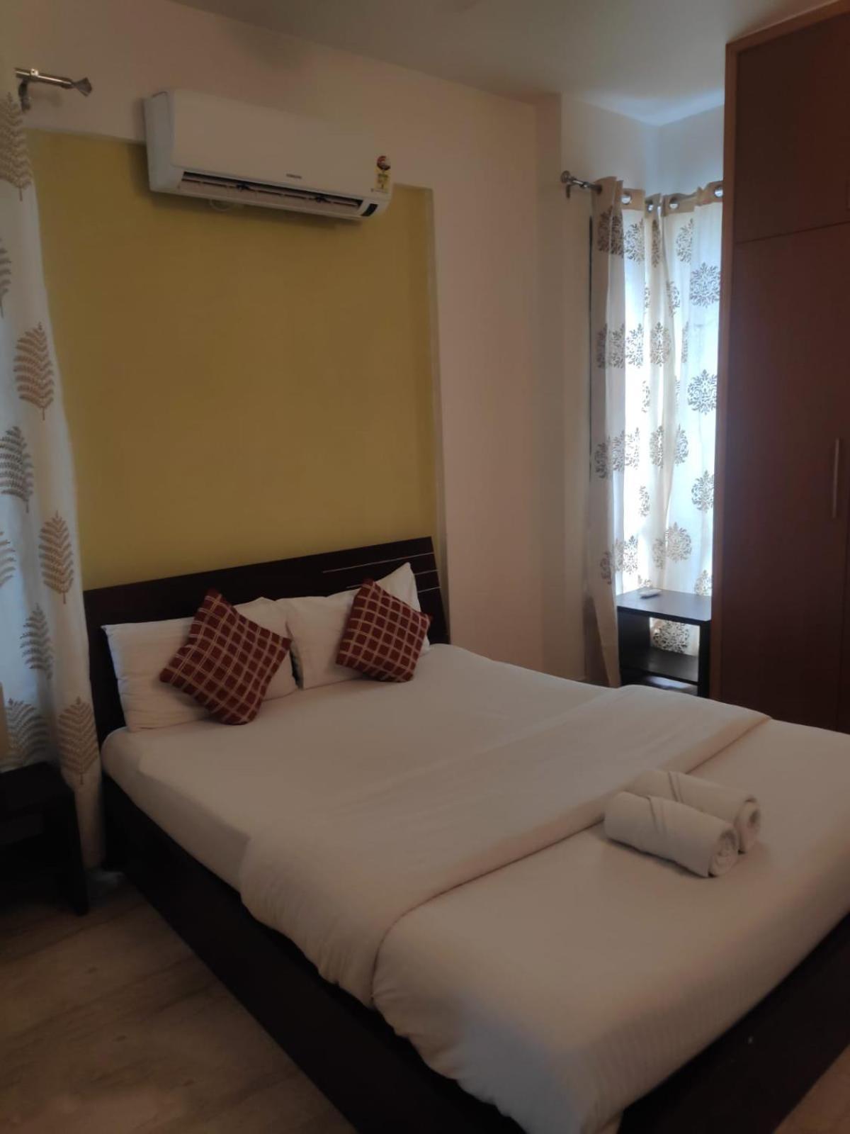 Ixora Suites Bangalore Exterior foto