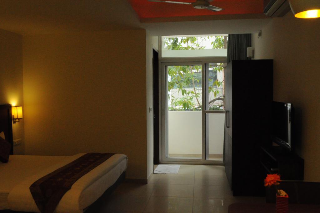 Ixora Suites Bangalore Zimmer foto