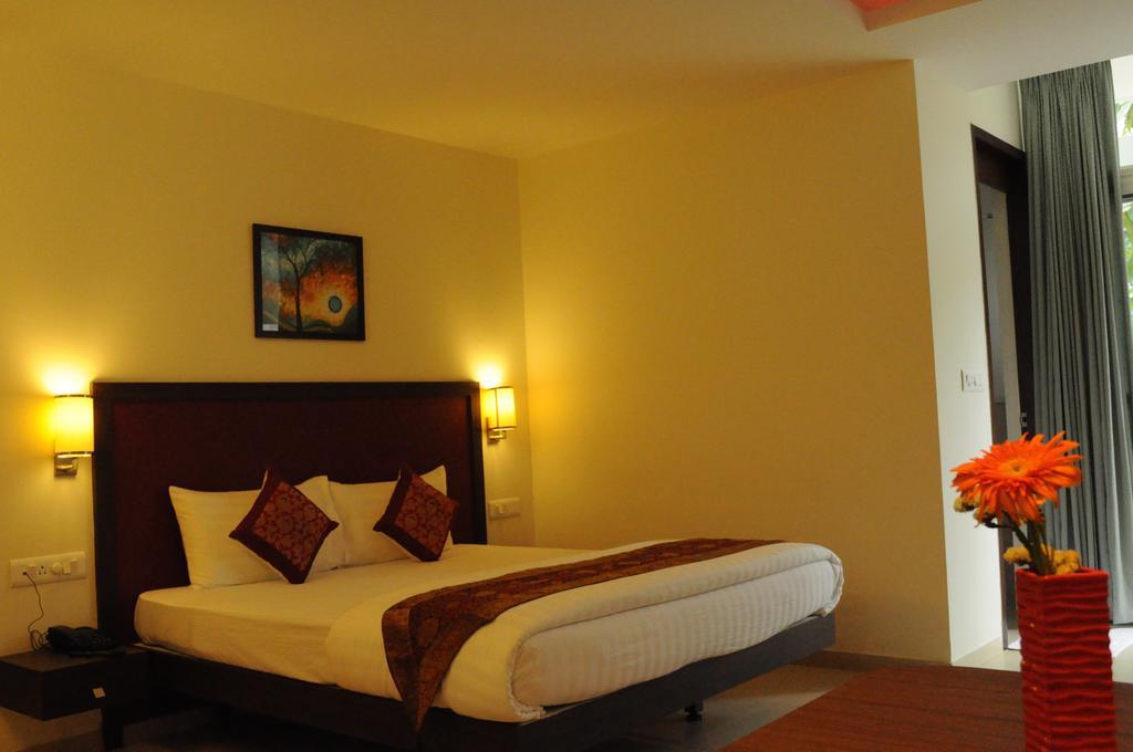 Ixora Suites Bangalore Zimmer foto